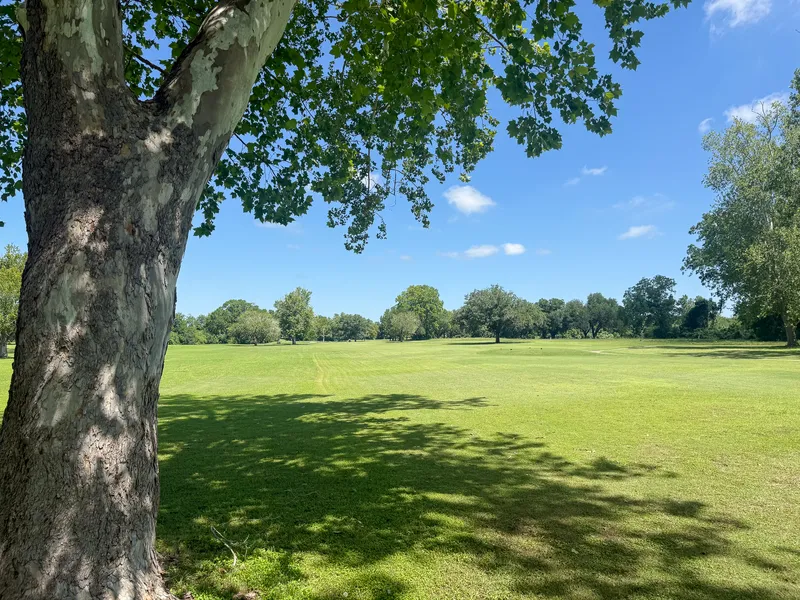 Shaded grounds looking out toward the golf course