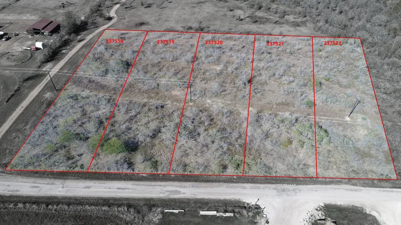 Aerial property photograph with illustrative parcel outlines