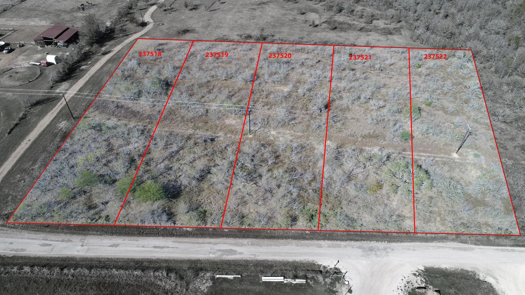 Aerial property photograph with illustrative parcel outlines